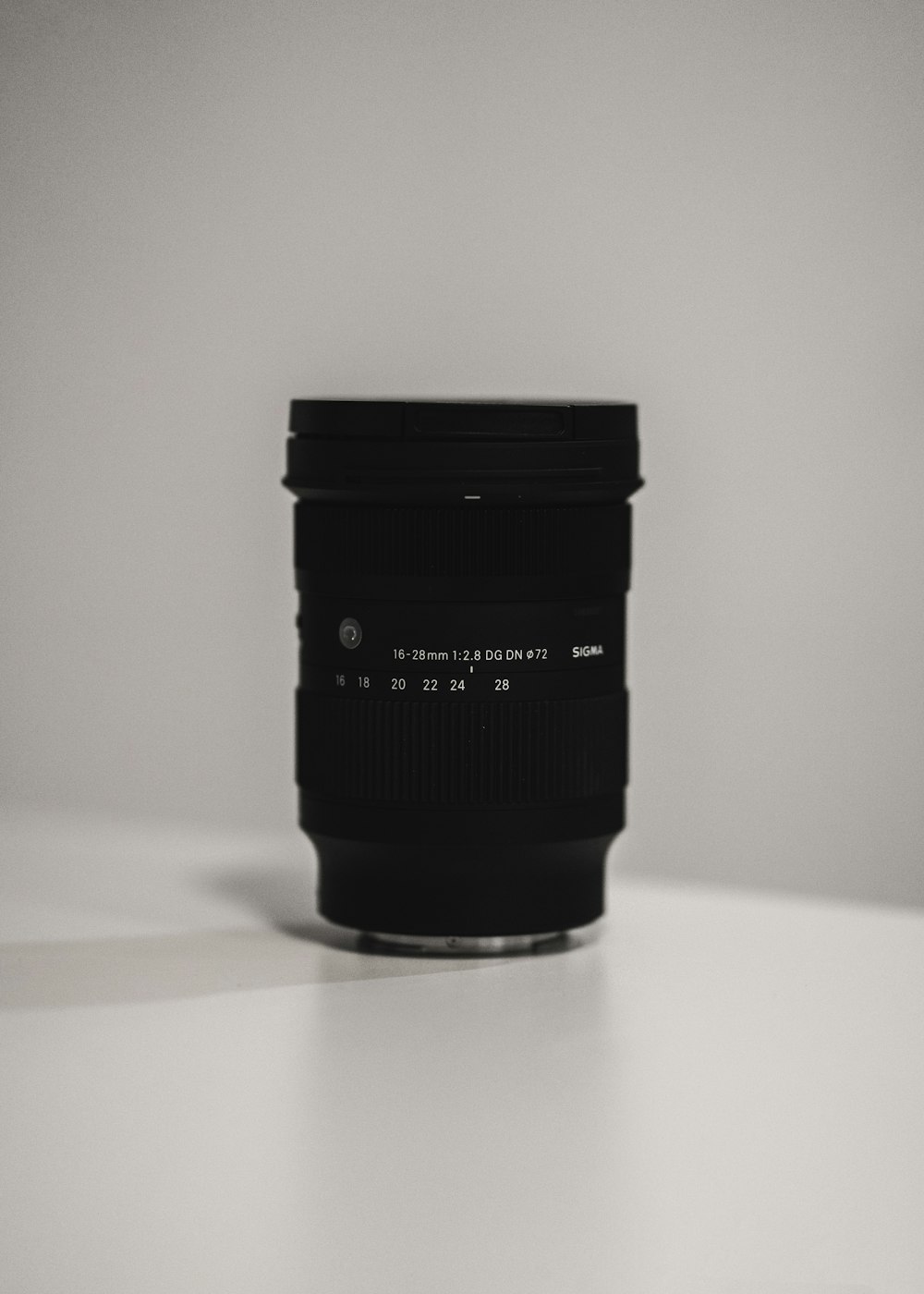 a camera lens sitting on top of a table