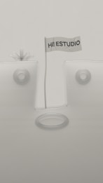 A minimalistic design featuring geometric shapes with a flag in the center that reads 'HI! ESTUDIO'. The background and objects are in muted tones, and the composition is symmetrical with circular elements.