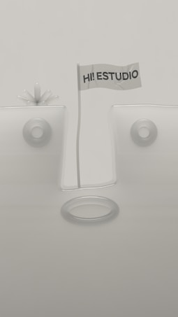 A minimalistic design featuring geometric shapes with a flag in the center that reads 'HI! ESTUDIO'. The background and objects are in muted tones, and the composition is symmetrical with circular elements.