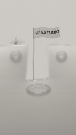 A minimalistic design featuring geometric shapes with a flag in the center that reads 'HI! ESTUDIO'. The background and objects are in muted tones, and the composition is symmetrical with circular elements.