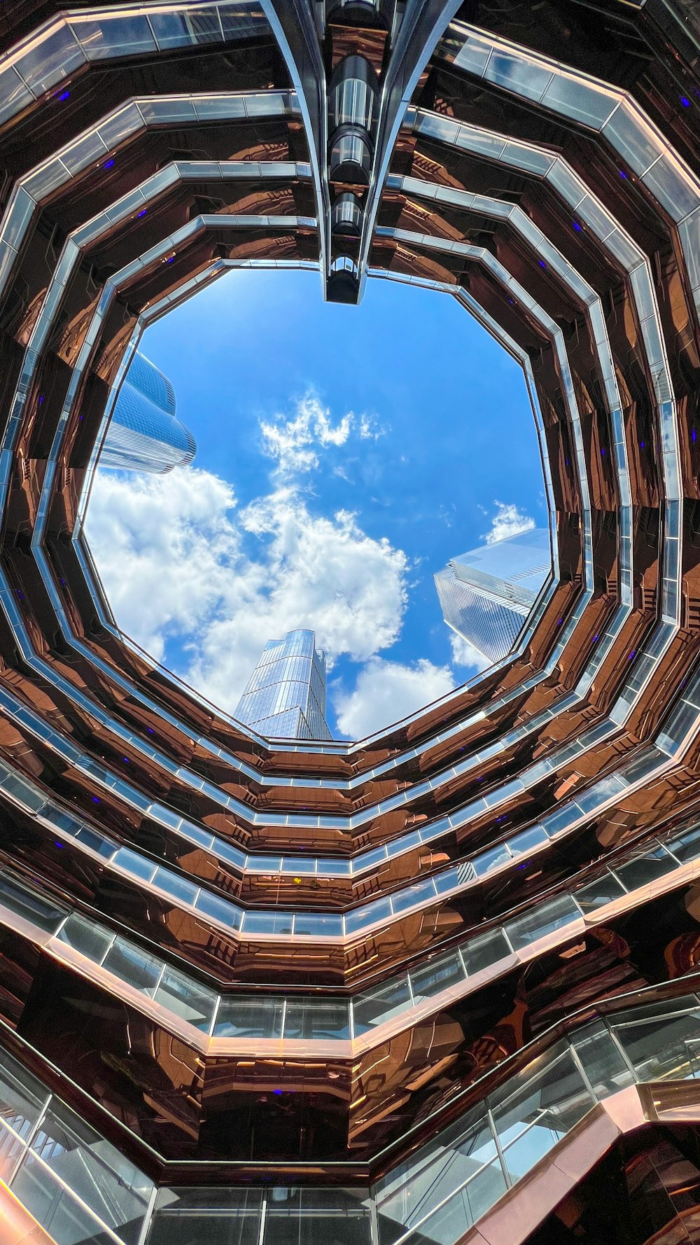 a very large building with a sky background