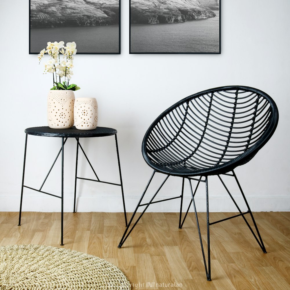 a couple of chairs sitting on top of a hard wood floor