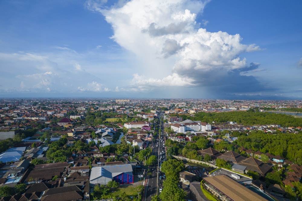 an aerial view of a city with lots of houses