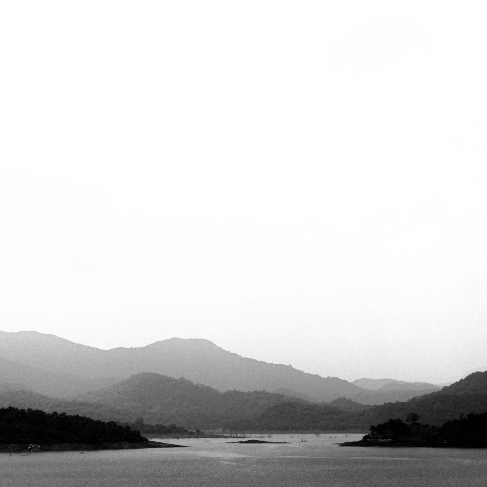 a large body of water surrounded by mountains