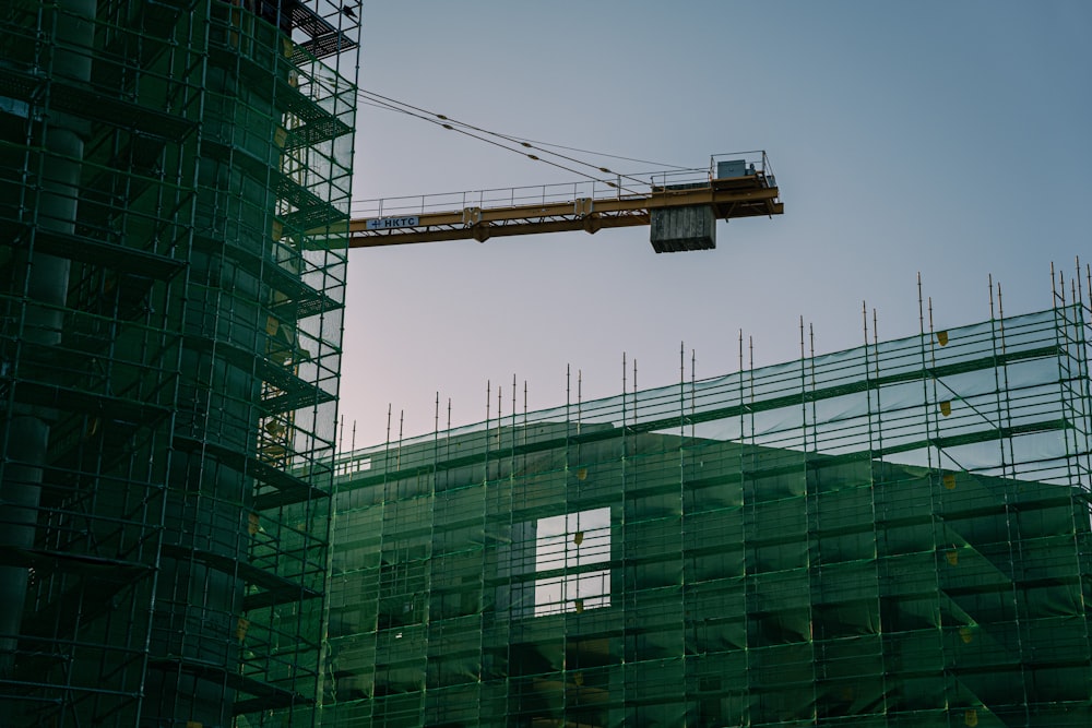 a crane that is on top of a building