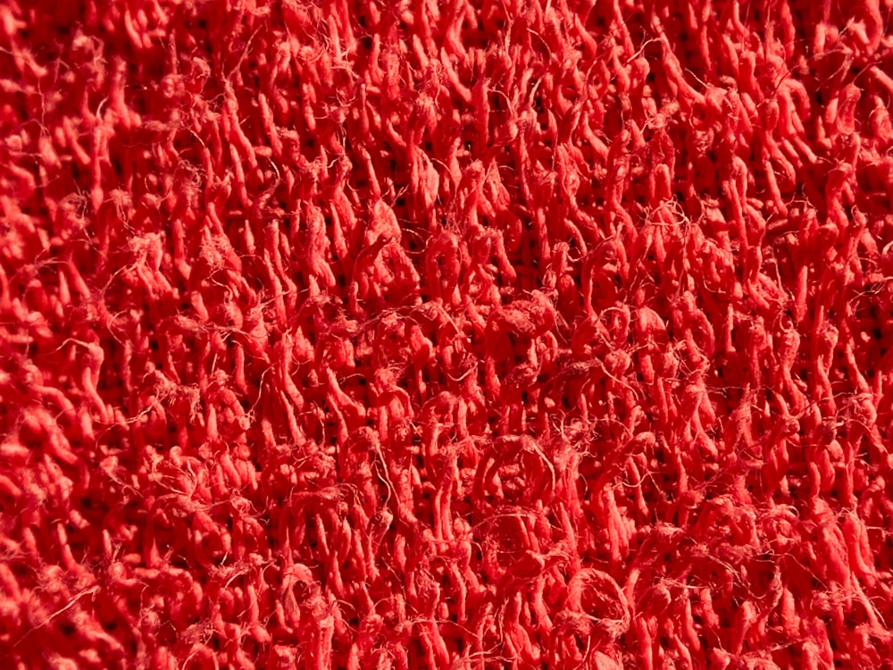 a close up of a red carpet texture