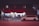 A building with a store called 'Youniform Market' features prominently, displaying a red awning with text. Brightly lit window displays show clothes and mannequins inside. A white minivan is parked in front of the store on a quiet street at night, with some streetlights providing illumination.