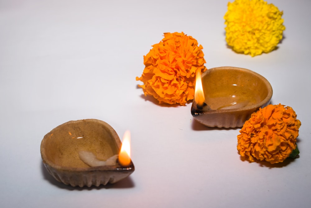 a couple of candles that are sitting on a table