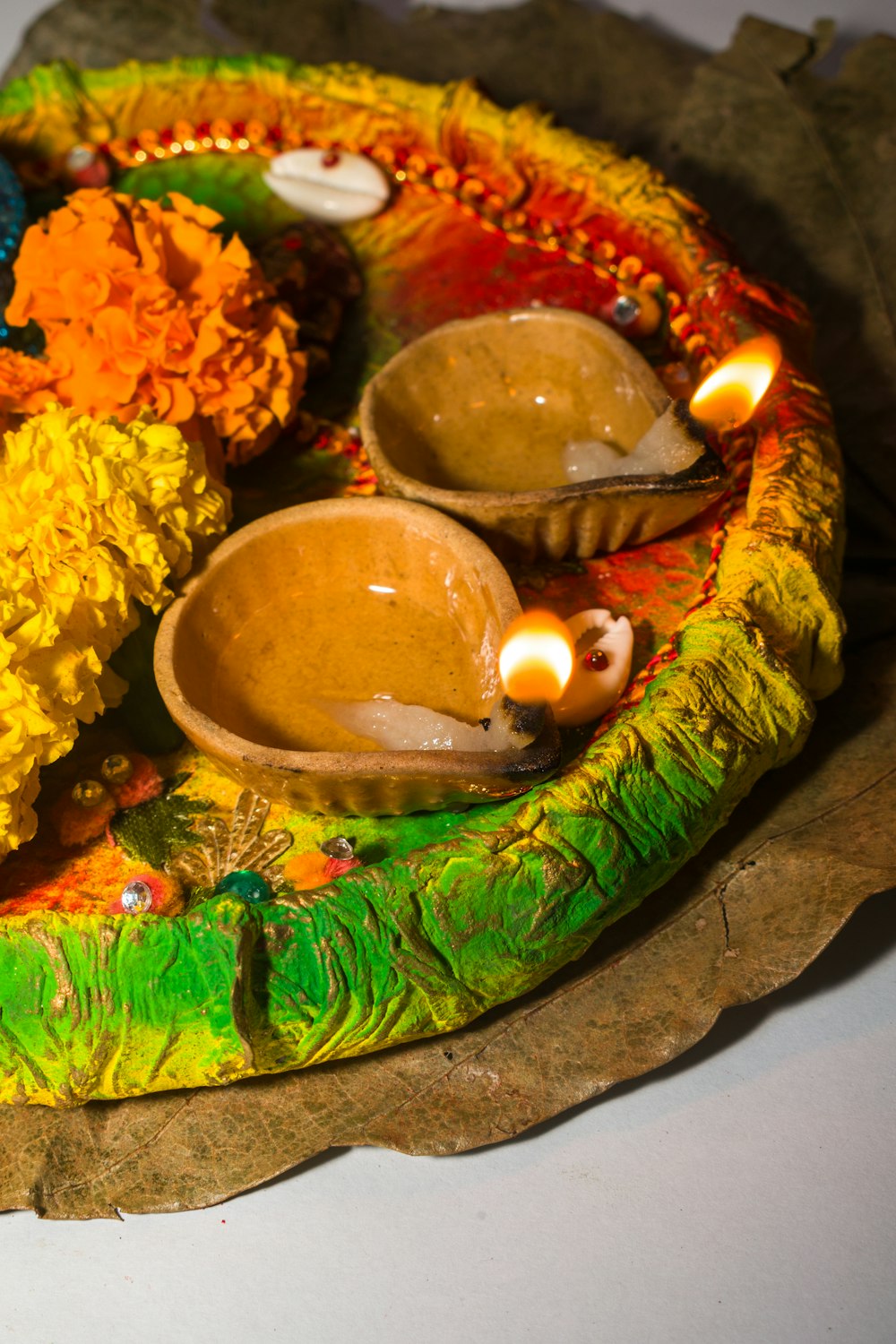 a plate of food with candles on top of it