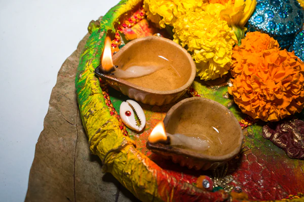 Bowl pleated with different coloured flowers for thamboolam decor