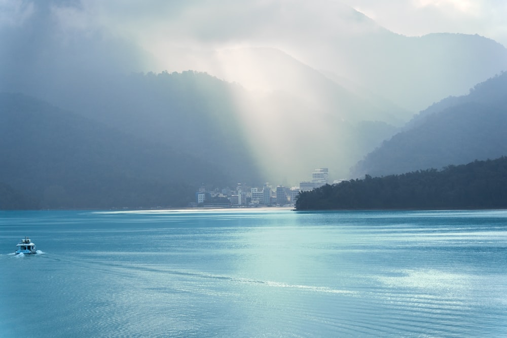 a boat traveling across a large body of water