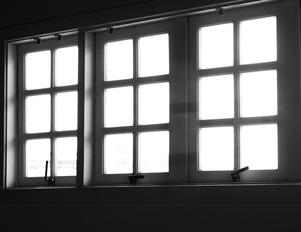 a black and white photo of a window