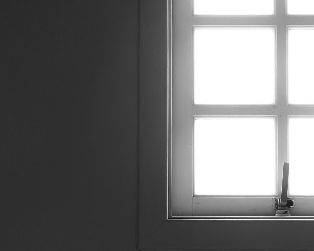 a black and white photo of a window