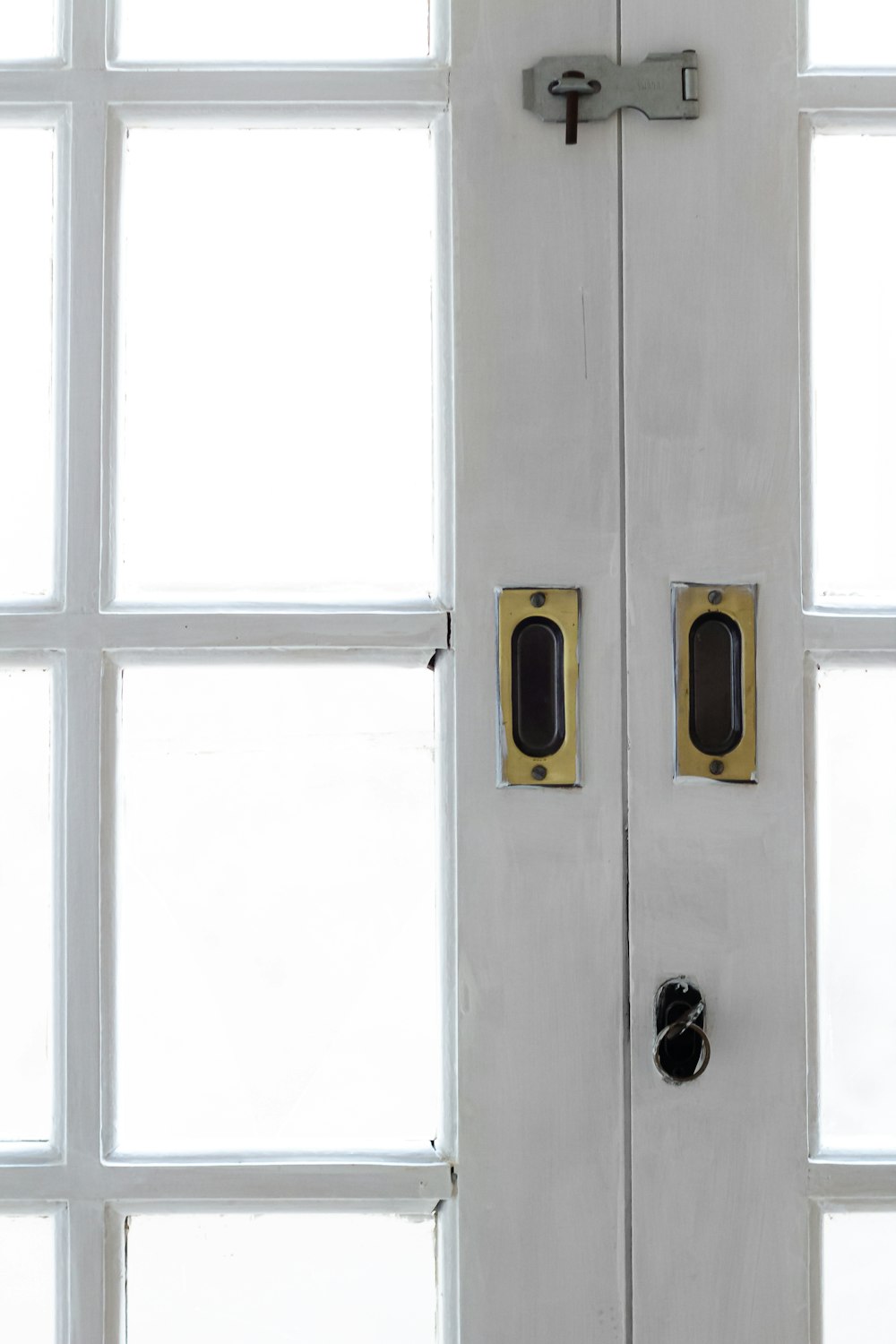 a close up of a door with two knobs
