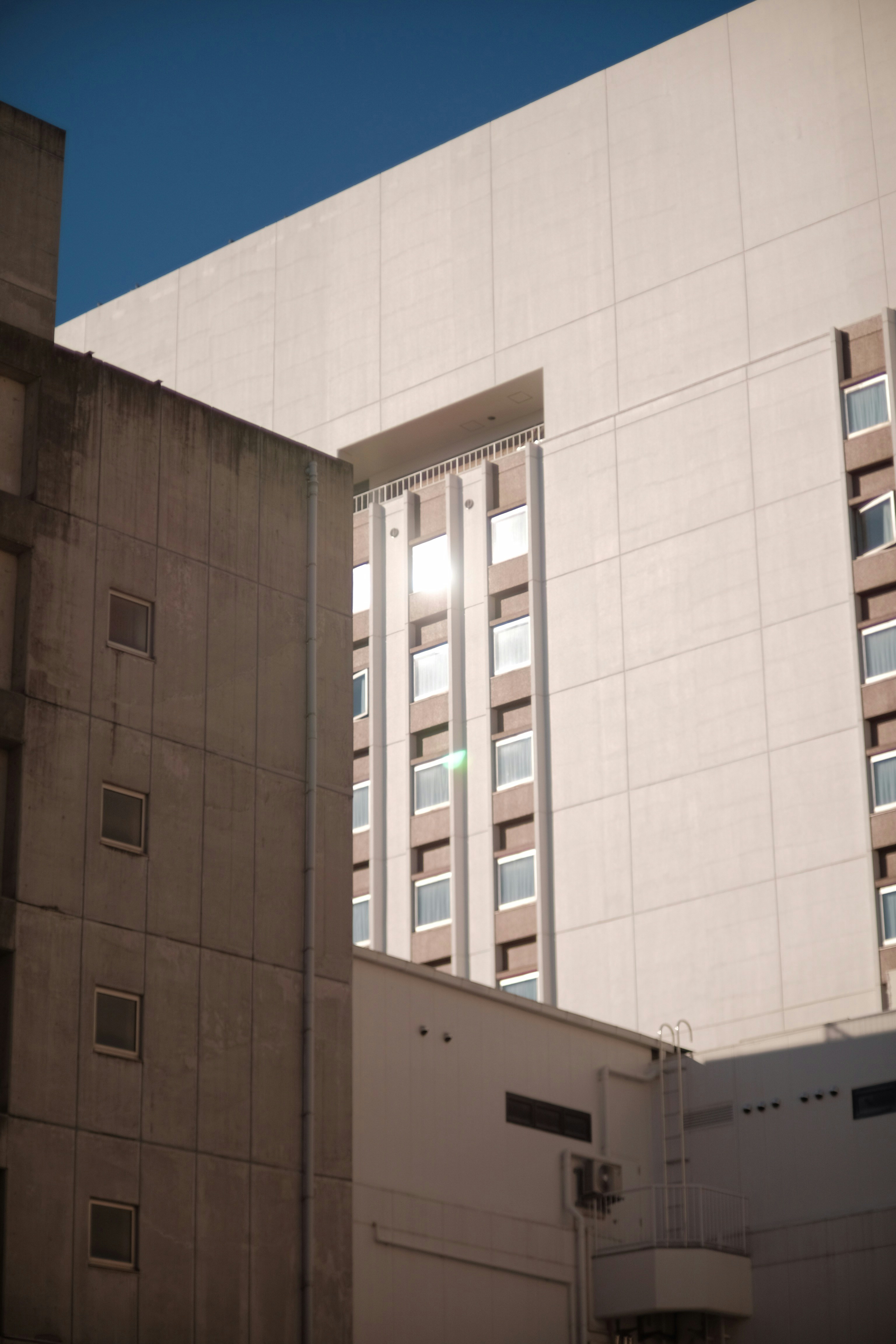 a tall building with a clock on the side of it