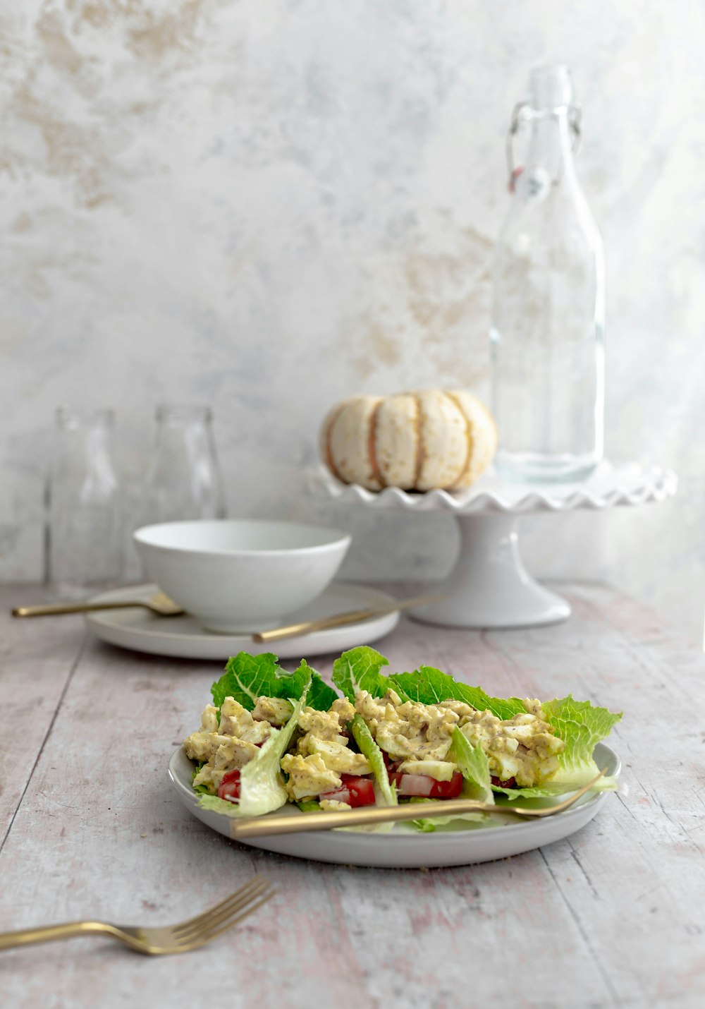 a plate of food on a wooden table