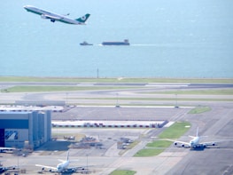 An airplane taking off from an international airport, symbolizing global air cargo services.