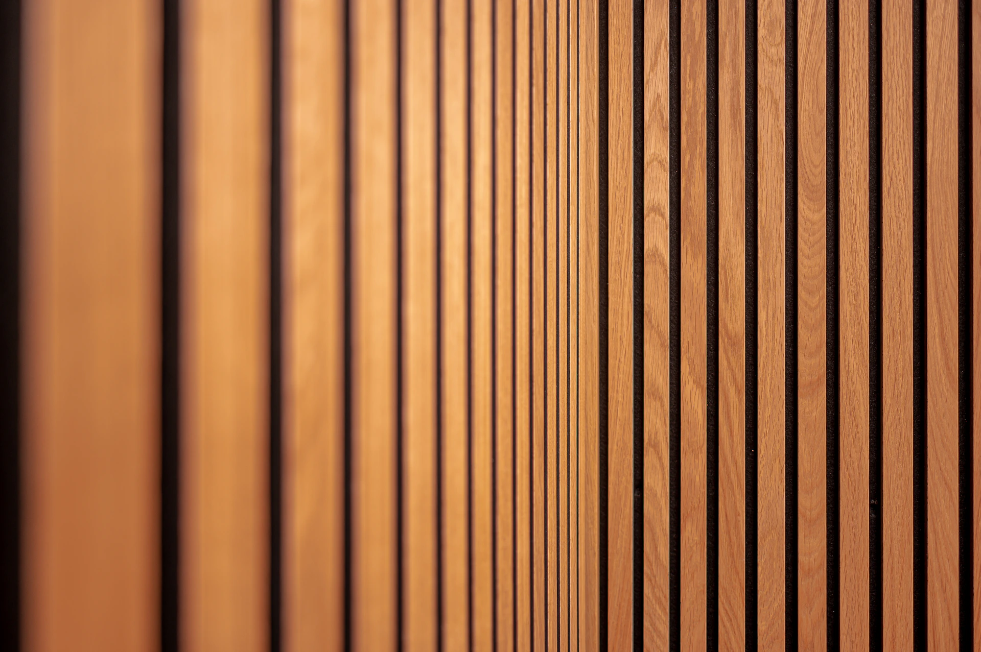 a close up of a wall made of wooden slats
