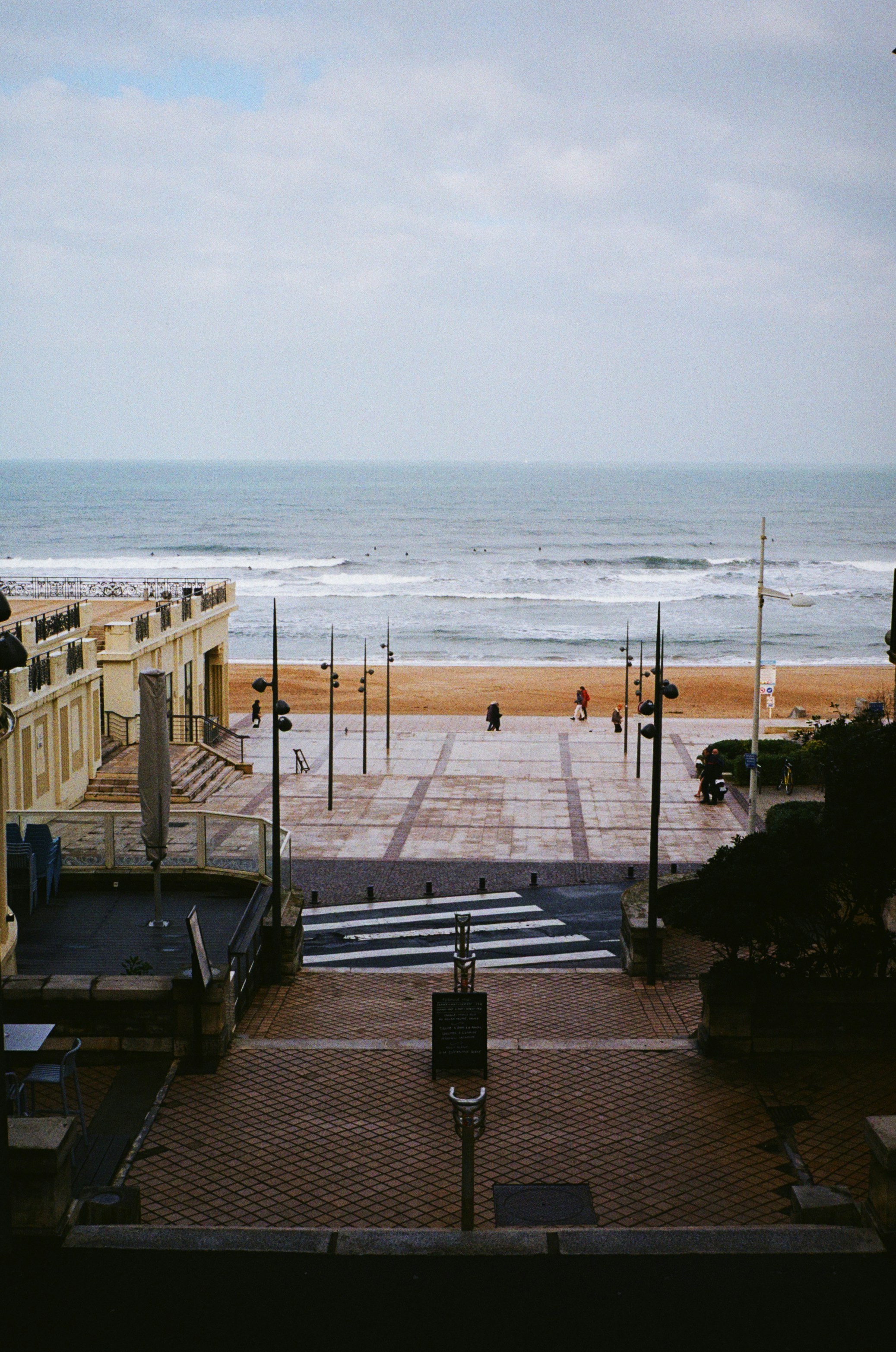 a view of a beach from a balcony
