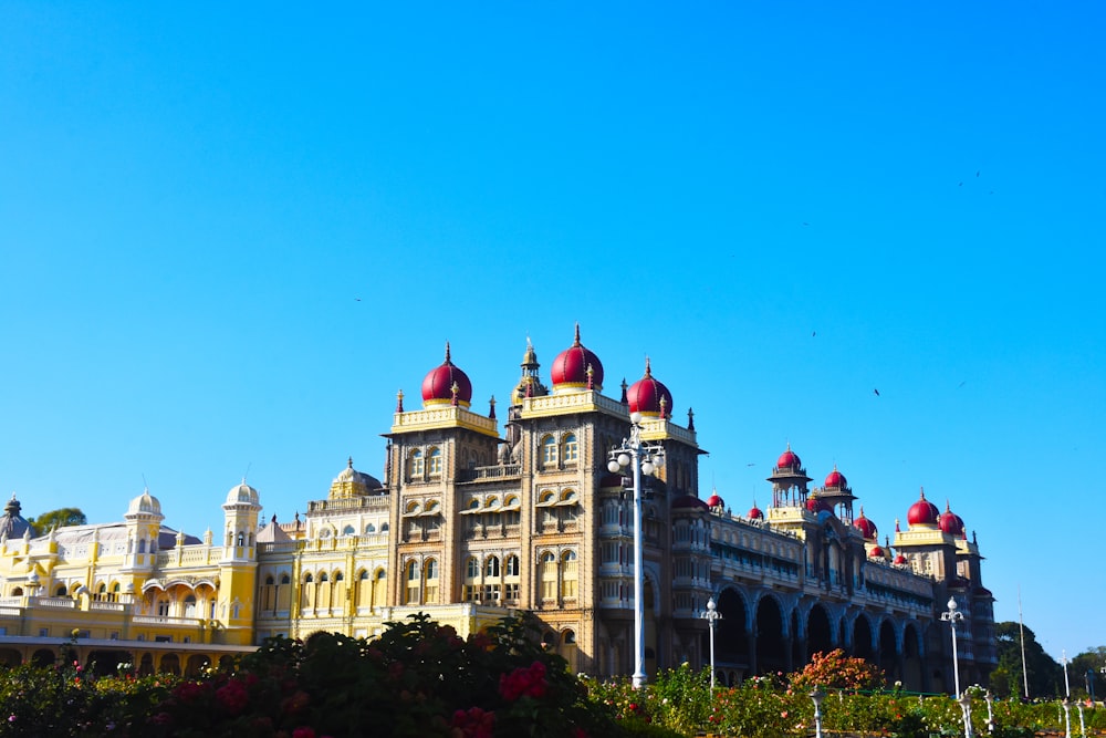 a large building with red domes on top of it