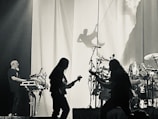 A promotional image of Figg Newton performing live.