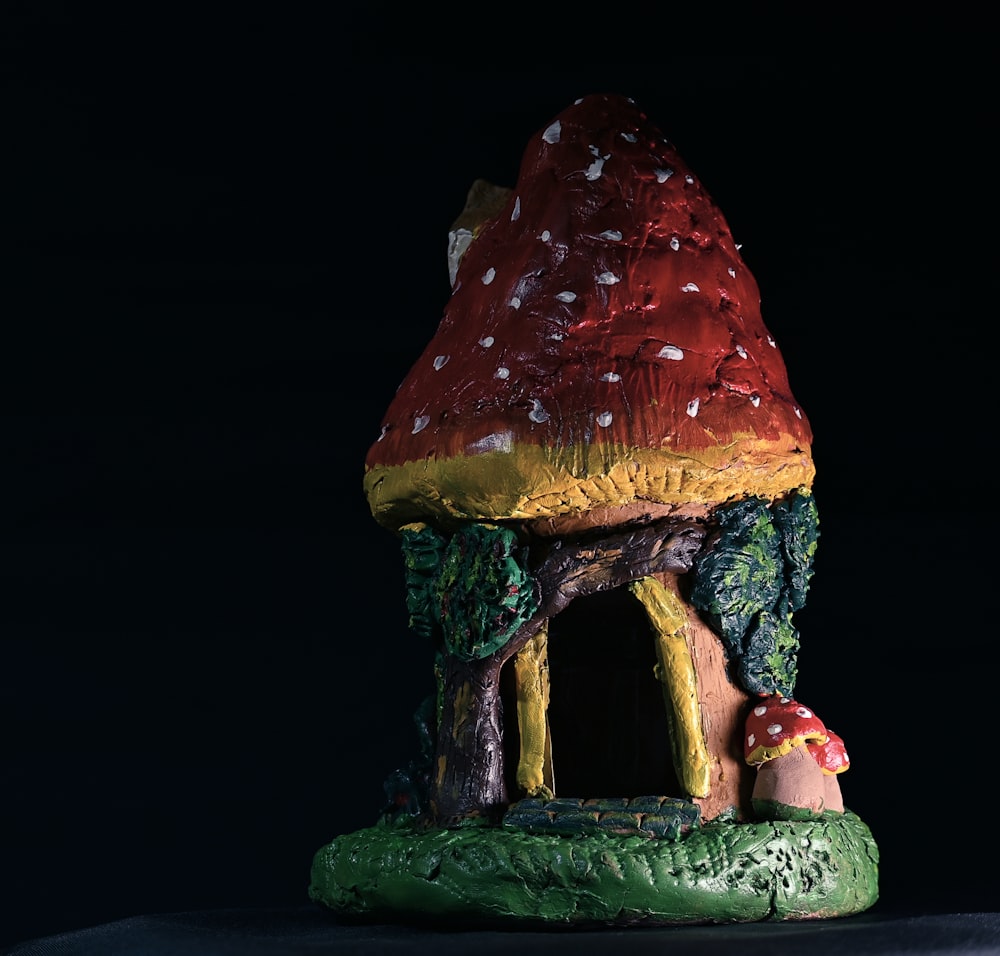 a mushroom house with a mushroom on top of it