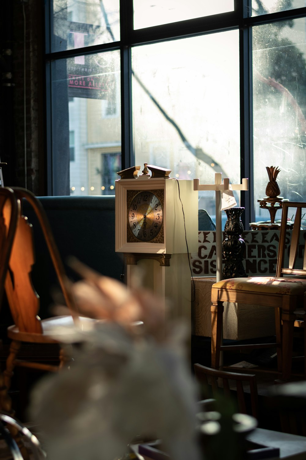 a room filled with furniture and a large window