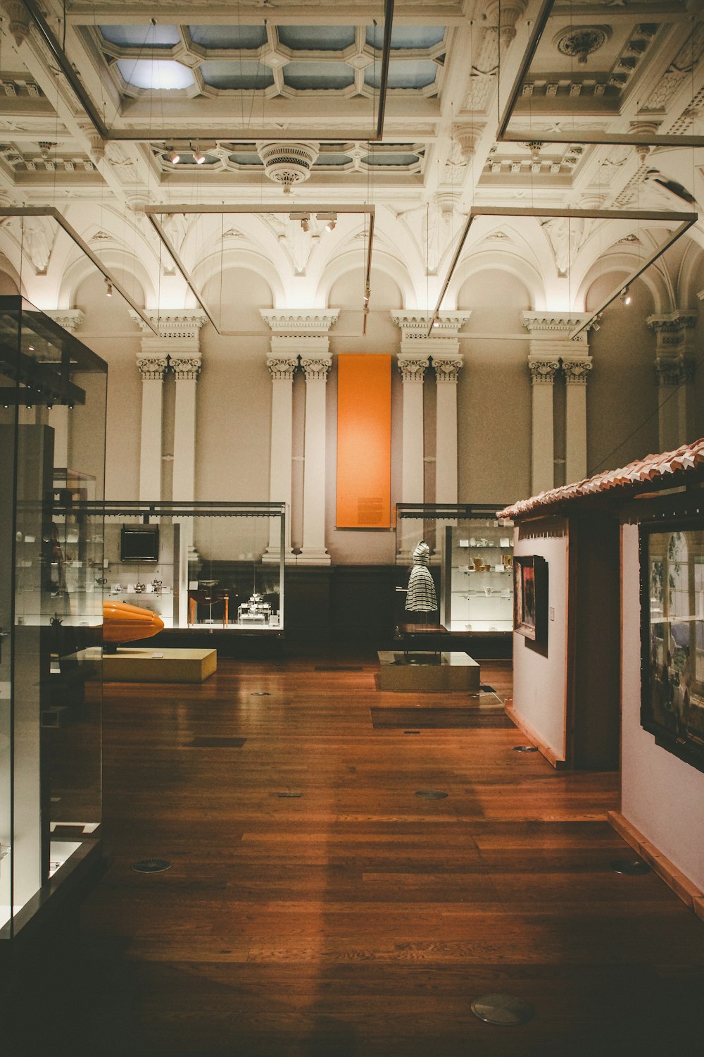 a large room with a lot of glass cases
