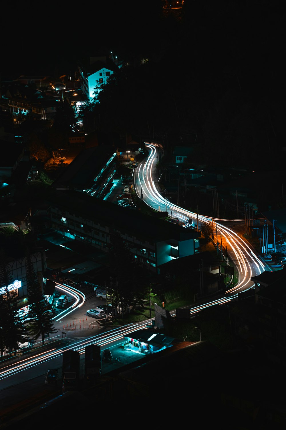 an aerial view of a city at night