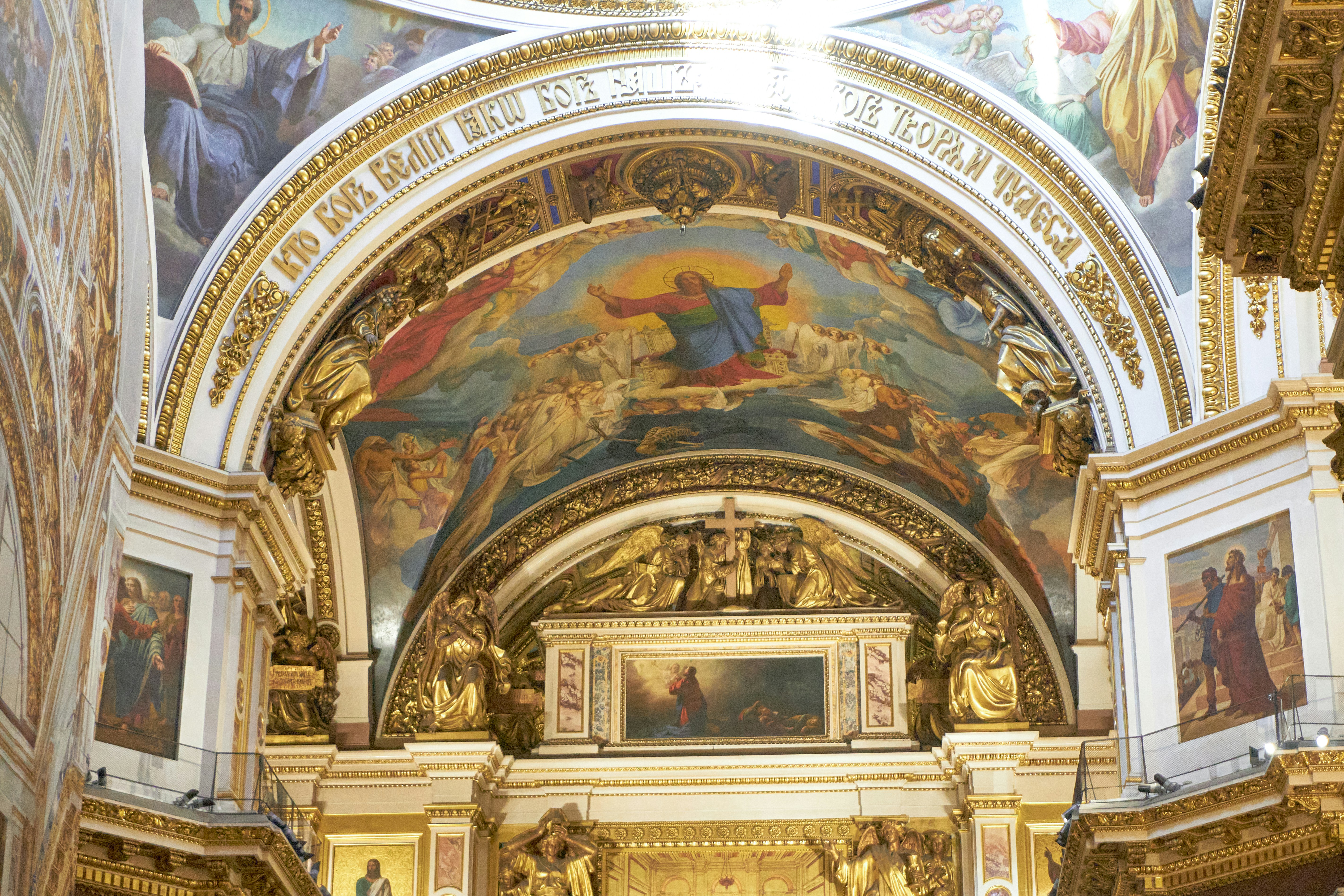 a church with a painting of jesus on the ceiling