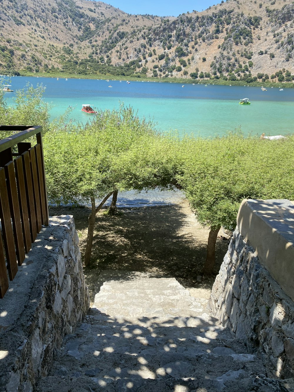 a view of a body of water from a set of stairs
