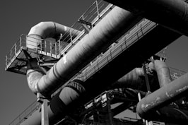 a black and white photo of pipes and pipes