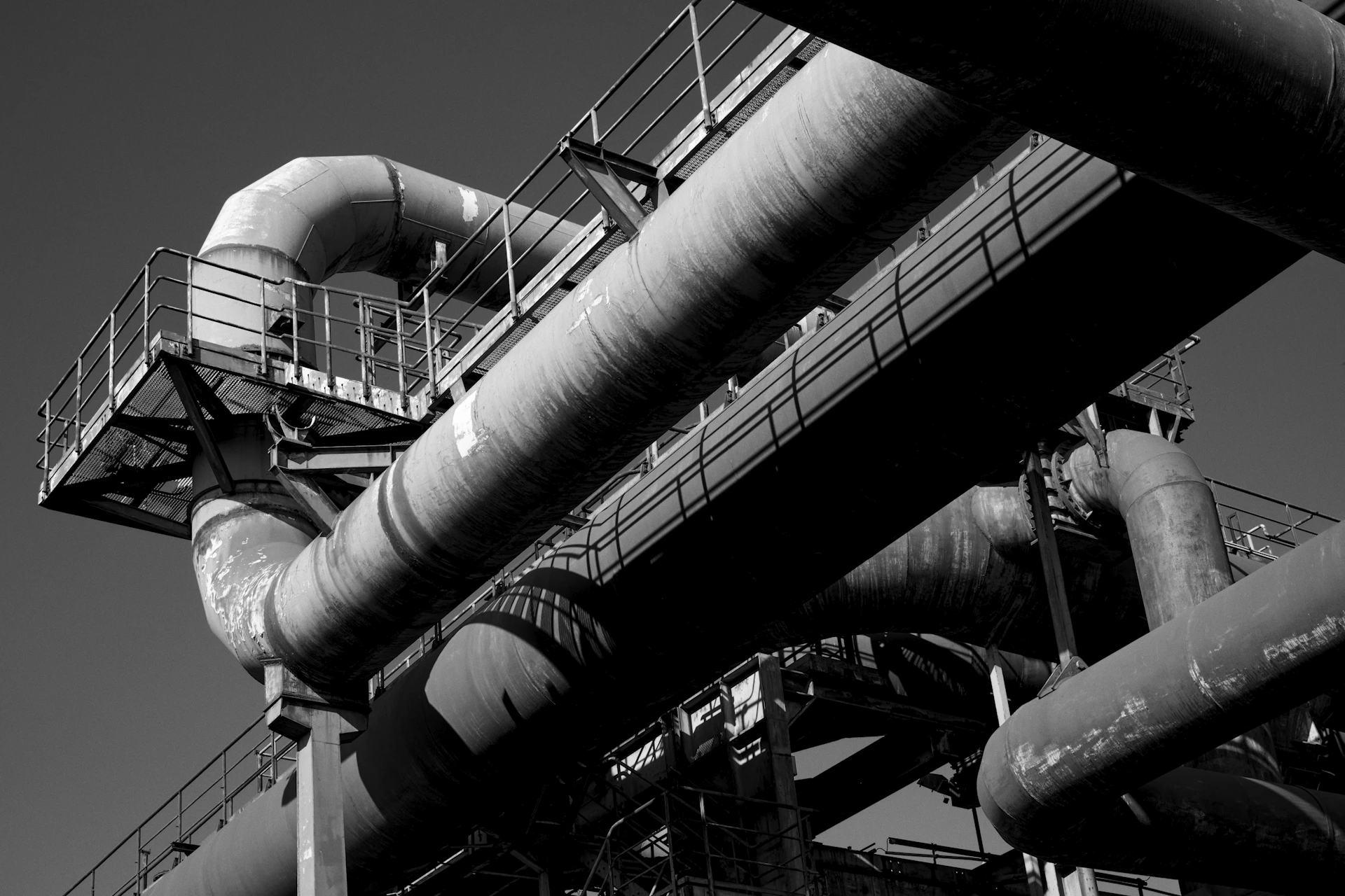 a black and white photo of pipes and pipes