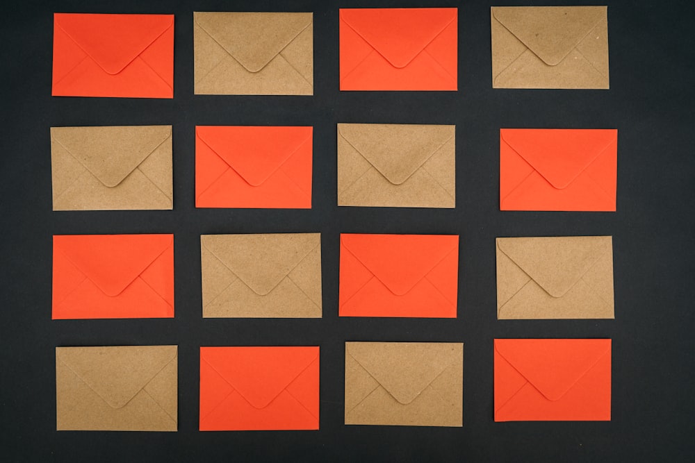 a group of orange and brown pieces of paper