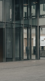 A sleek glass film application on a contemporary storefront.