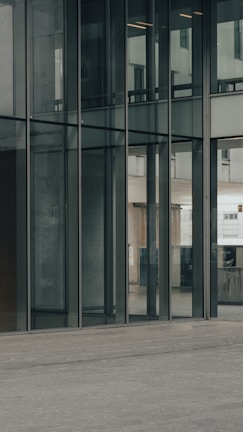 Custom aluminum and glass shop front with clean lines and polished finish.