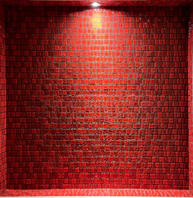 Close-up of glossy wall tiles with glowing red accents and subtle glassmorphism effects.