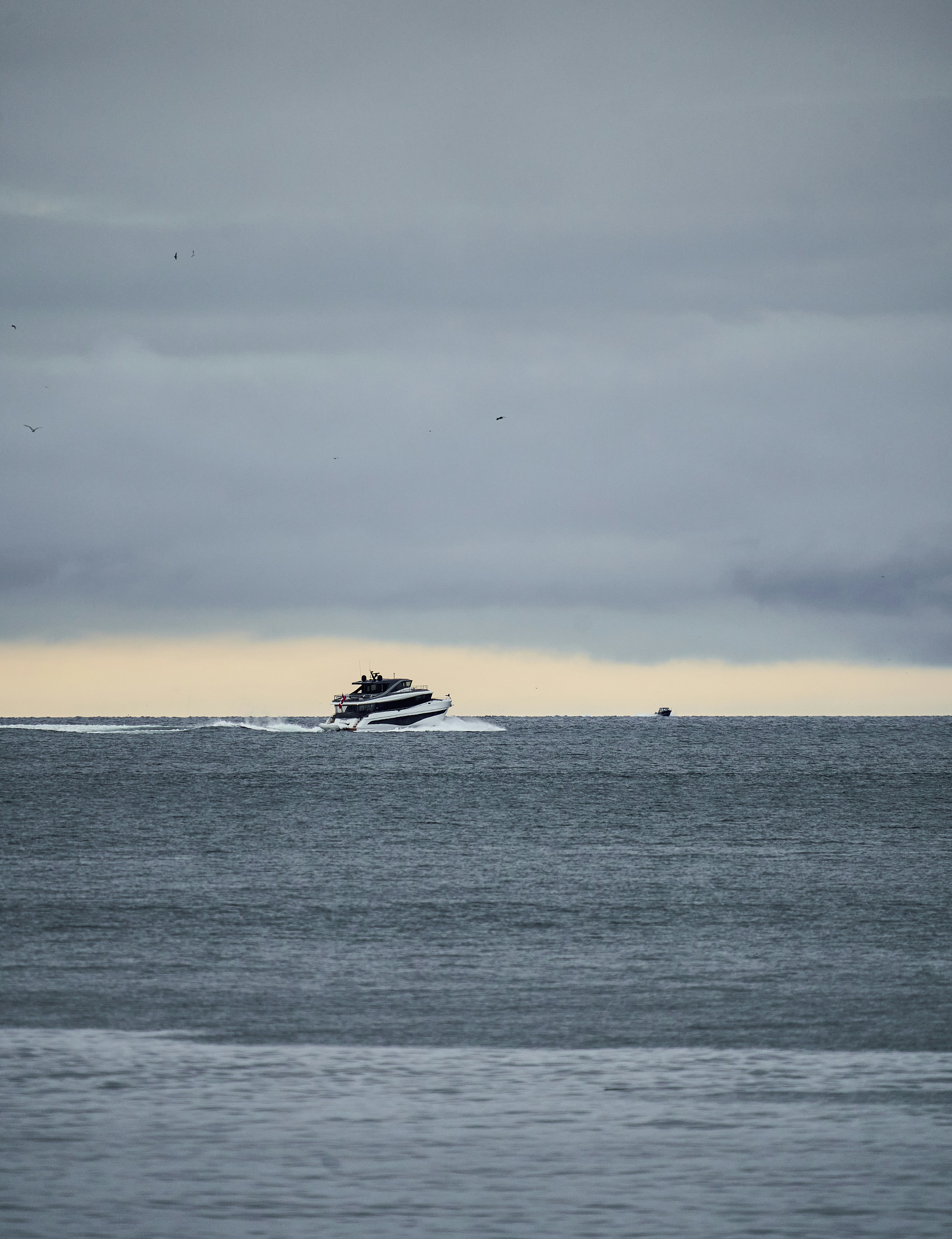 a boat is in the middle of the ocean