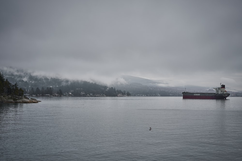 a large boat floating on top of a large body of water