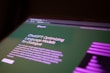 a close up of a computer screen with a blurry background