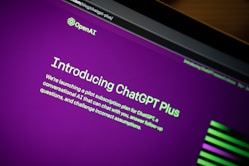 a close up of a computer screen with a purple background