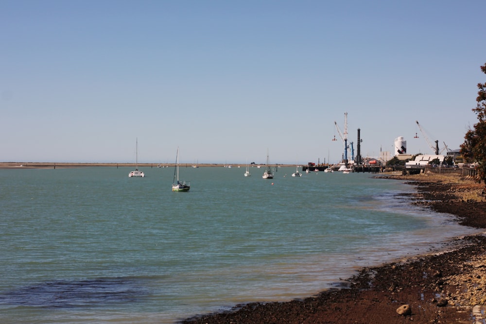 a body of water with boats floating in it