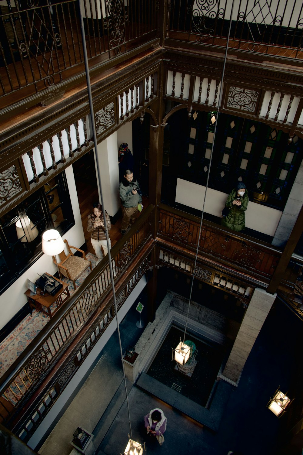 a view of a living room from the second floor of a building