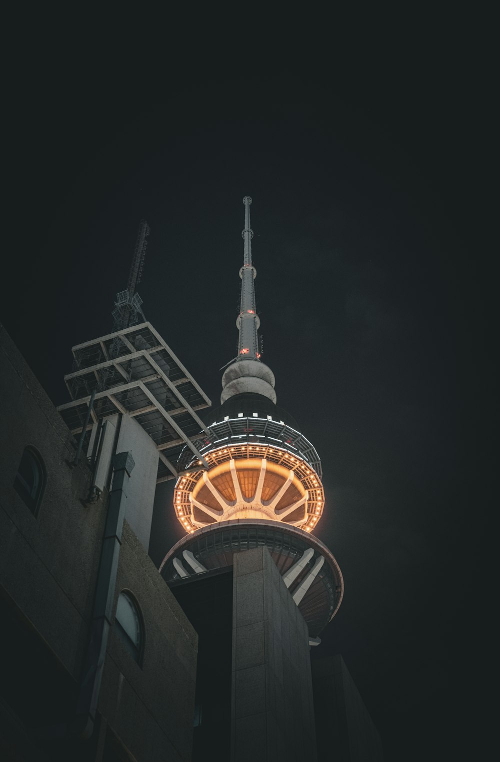 a tall tower with a clock on it's side