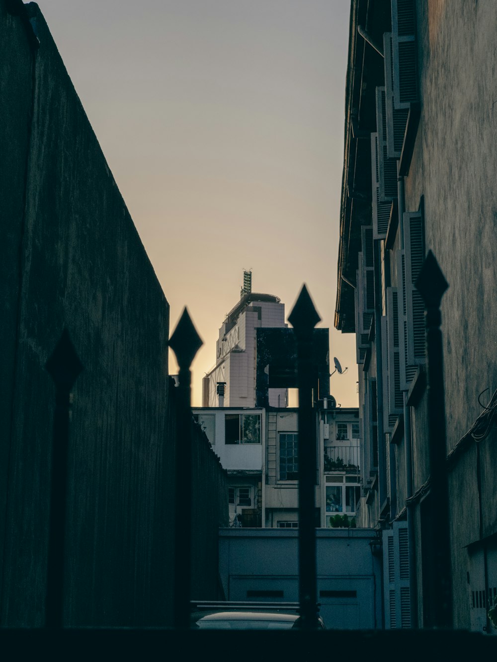 a street sign in front of a row of buildings