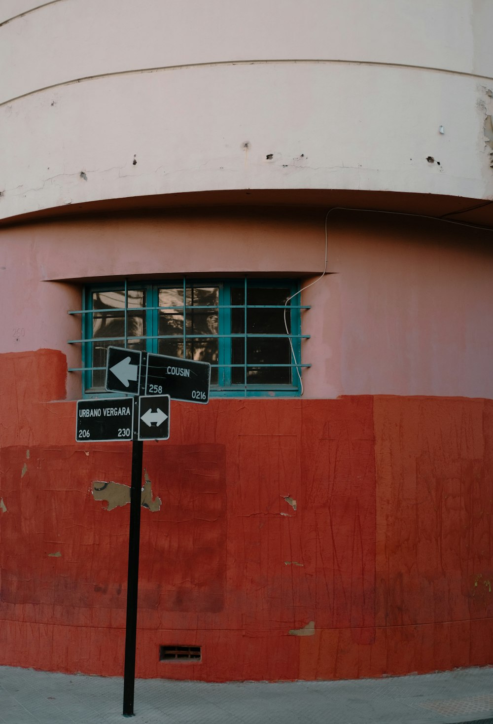 a street sign in front of a building