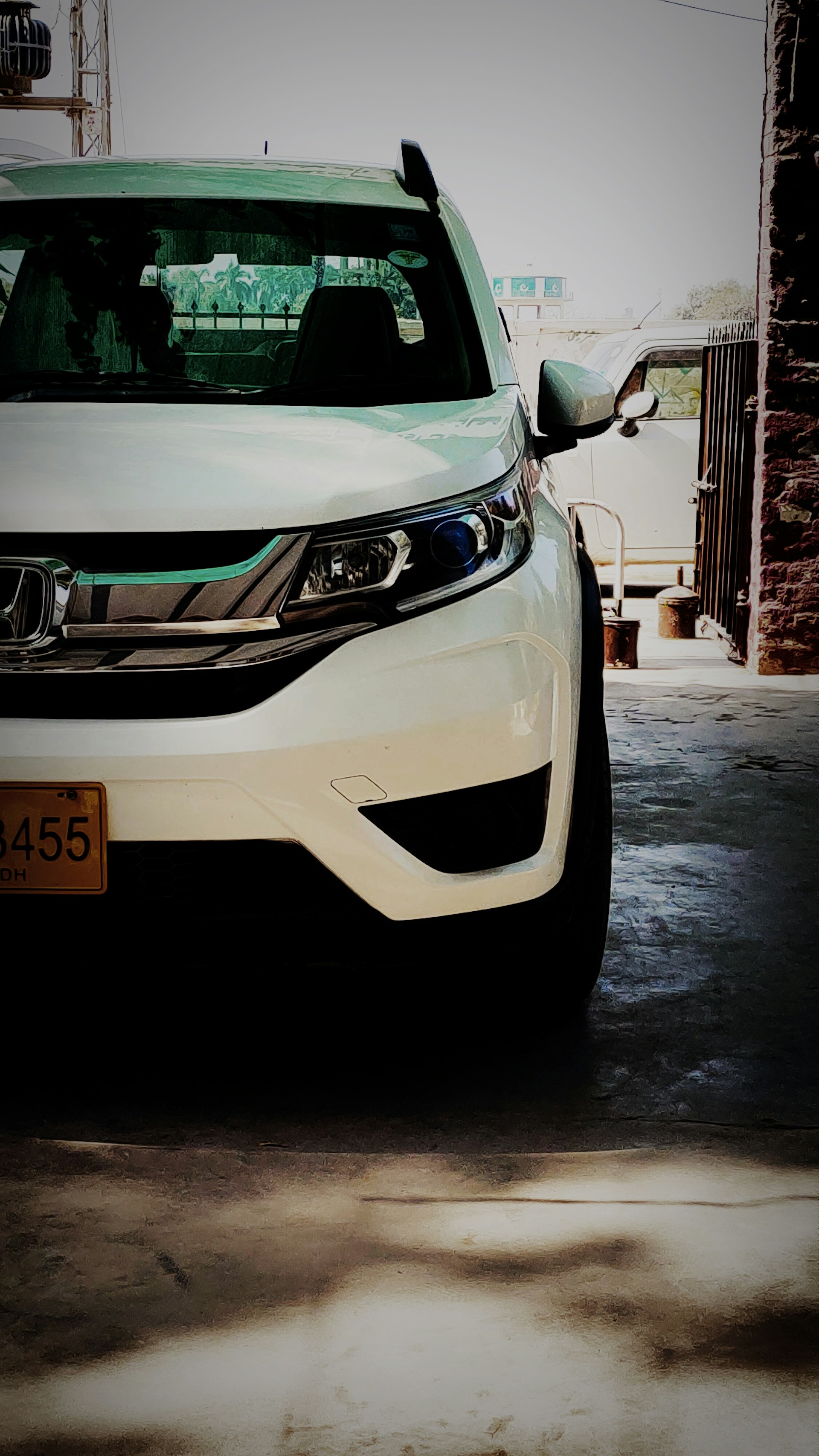 woman wearing yellow long-sleeved dress under white clouds and blue sky during daytime