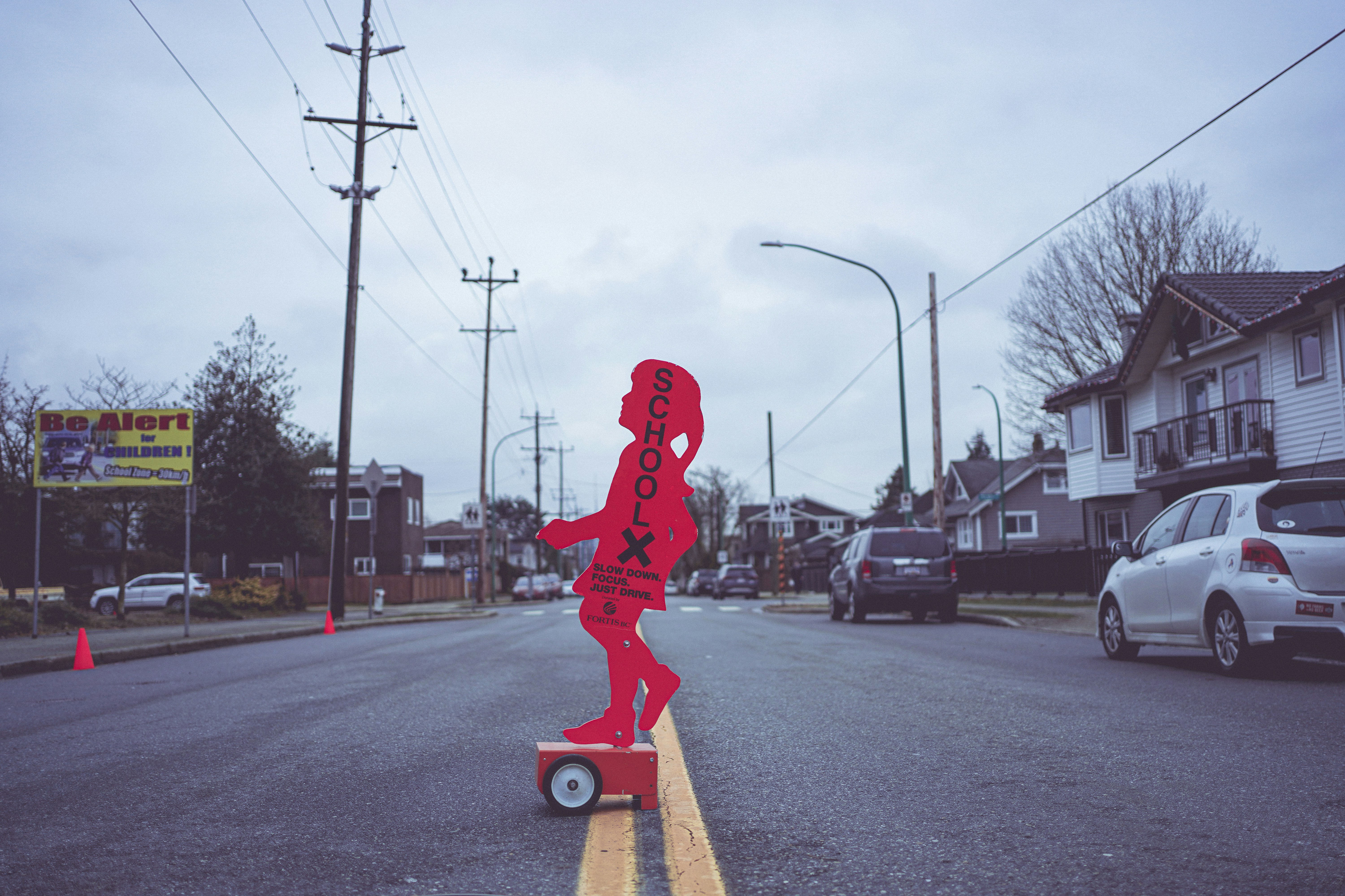 a person riding a skateboard on a city street