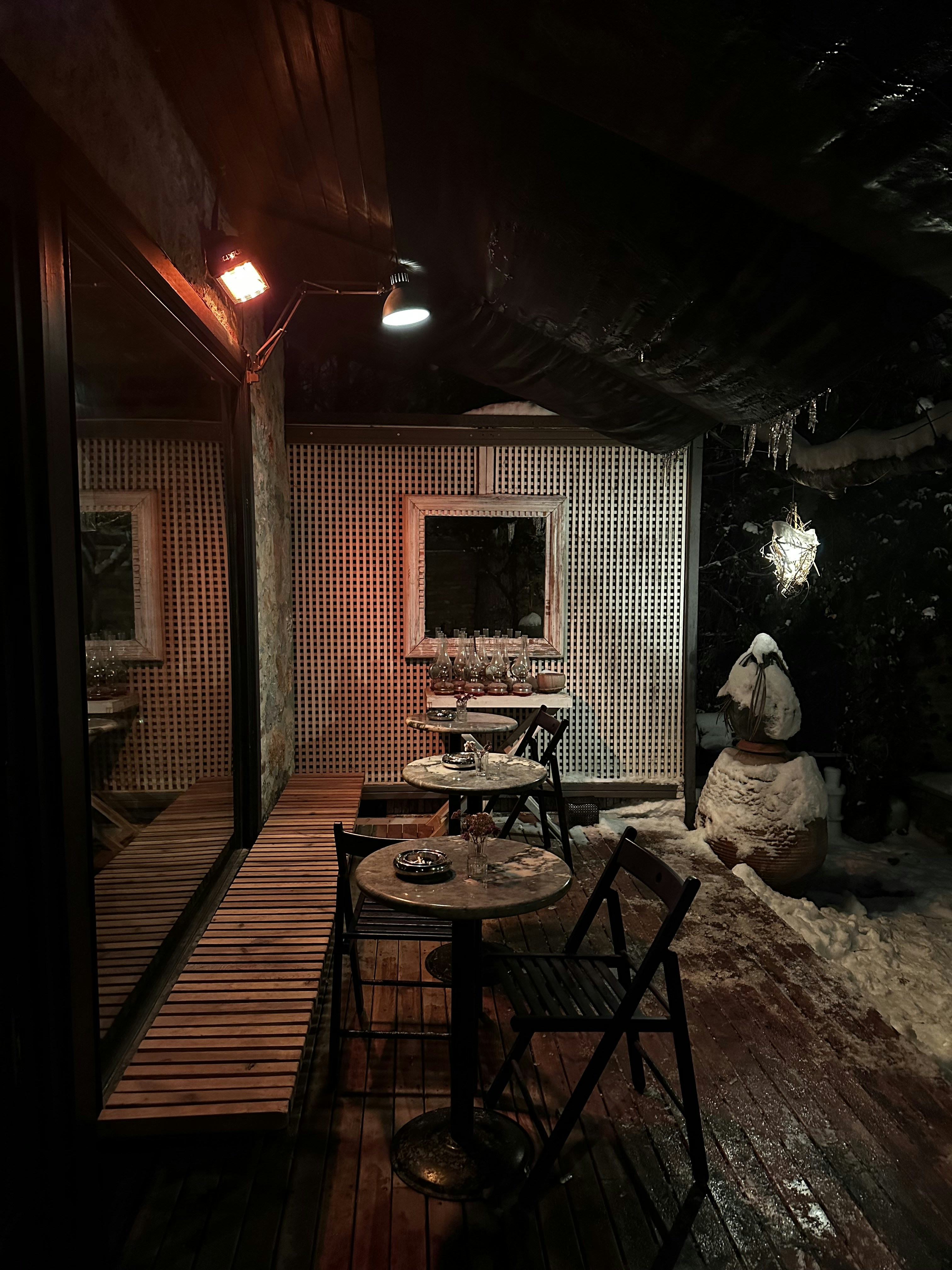 a room with a table, chairs and a snowman