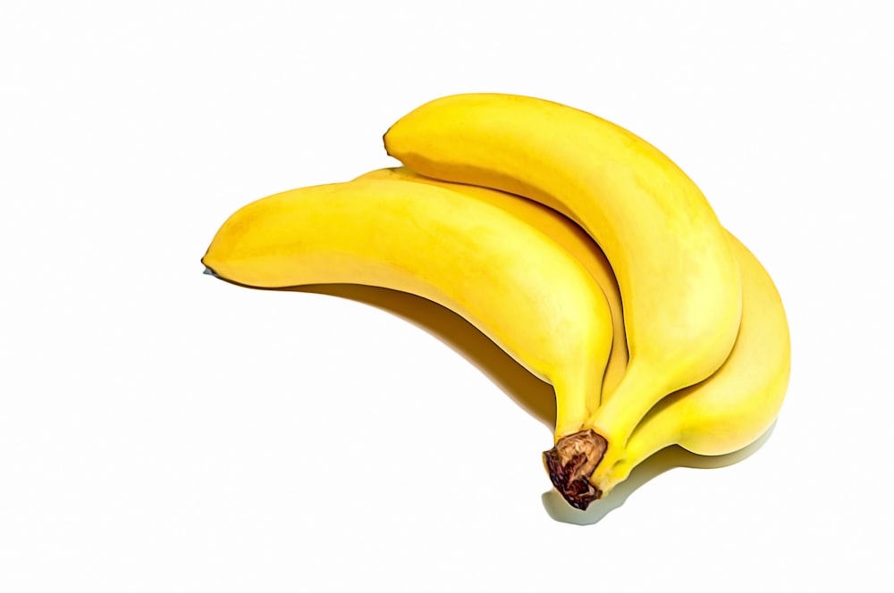 a bunch of ripe bananas on a white background